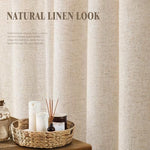 Cream cotton style neutral cloth drape hanging elegantly in a modern bathroom