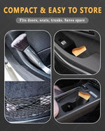 Microfiber side of the two-in-one duster clearing dust from a vehicle center console display screen.