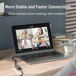 Compact Uni USB-C wired internet adapter being plugged into a modern laptop port