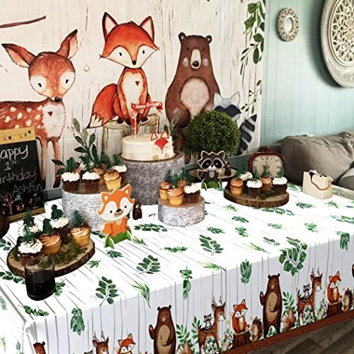 Waterproof birthday party table supply protecting a wooden surface from liquid spills.