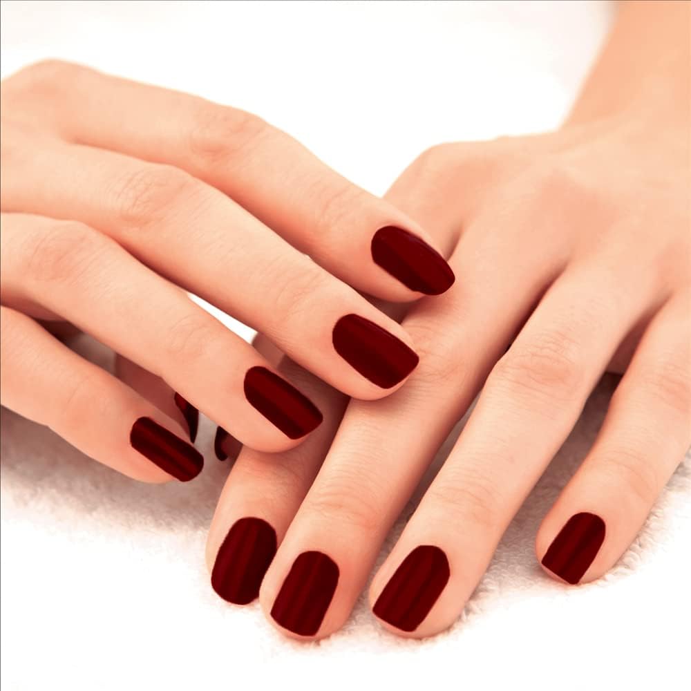 Lakmé Smokey Crimson nail polish bottle texture display
