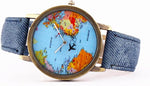 MINILUJIA airplane world map watch angled view highlighting the blue jeans fabric strap