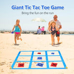 Family playing Cwlakon giant outdoor yard game at a park.