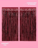 Xo Fetti shimmering maroon foil fringe curtain hanging over a standard doorway frame
