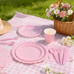Table setting demonstration using Ohkishly pink party decorations.