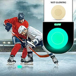 Glow in the dark roller hockey pucks absorbing light for training