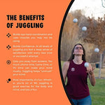 Zeekio Lunar Juggling Balls being held in an adult hand to illustrate the comfortable 110 grams sizing.