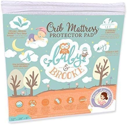 Baby and Brooke organic bamboo crib mattress protector front view showcasing premium packaging.