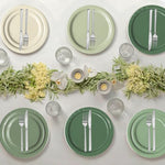 Sage green birthday party table setup with Oigco disposable plates