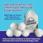 Six premium white wool dryer balls arranged next to a reusable cotton storage bag