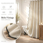 Heavy duty waterproof neutral cloth curtain hanging in a standard shower.