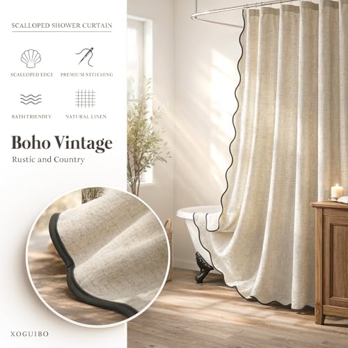 Heavy duty waterproof neutral cloth curtain hanging in a standard shower.