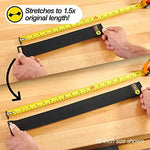 Weatherproof cable organizer strap securing a heavy duty extension cord in a workshop setting.