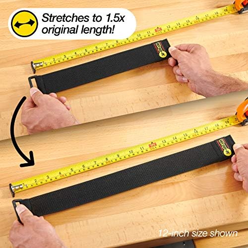 Weatherproof cable organizer strap securing a heavy duty extension cord in a workshop setting.
