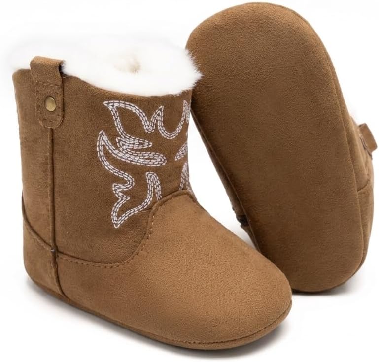 Zoolar toddler winter boots held in hand for scale