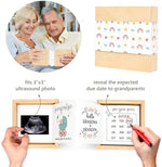 Open wooden ultrasound box showing the inner folded pages and custom due date tracker.