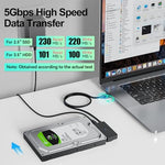 Clavoop external hard drive converter connected to a three point five inch hard drive showcasing the dedicated power supply setup
