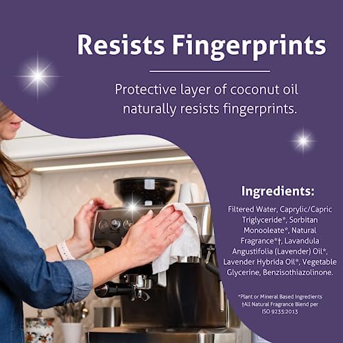 Close-up of Therapy non-toxic coconut oil infused wipes being used on a stainless steel sink