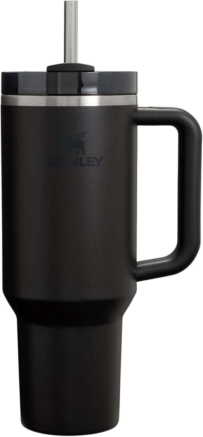 Stanley black tumbler front view with handle and straw