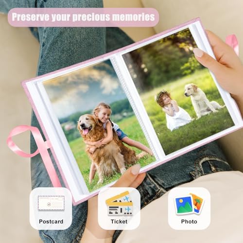 Side angle of the pink cloth bound anniversary memory book with decorative ribbon