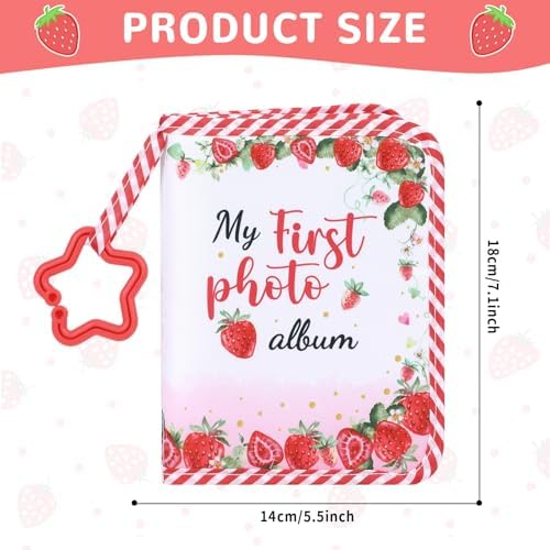 Open view of the baby first family memory album showing photo sleeves