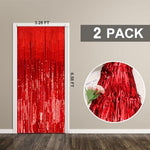 Pack of two red tinsel fringe curtains displayed in original packaging