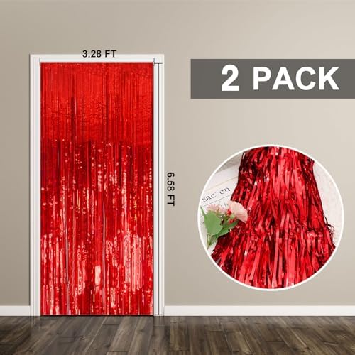 Pack of two red tinsel fringe curtains displayed in original packaging