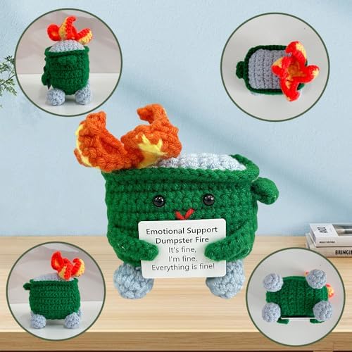 Handmade knitted green burning trash can support toy being held to show soft texture