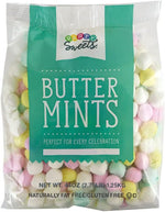Assorted pastel buttermints packed inside transparent mesh party favor bags.
