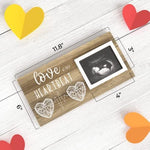 EURSET ultrasound picture frame holding a four by three inch infant sonography image on a table
