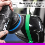 Koch Chemie Micro Cut compound applied on a machine polishing pad for dark sensitive car paint restoration