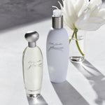 Close up of Estee Lauder Pleasures perfume label and bottle