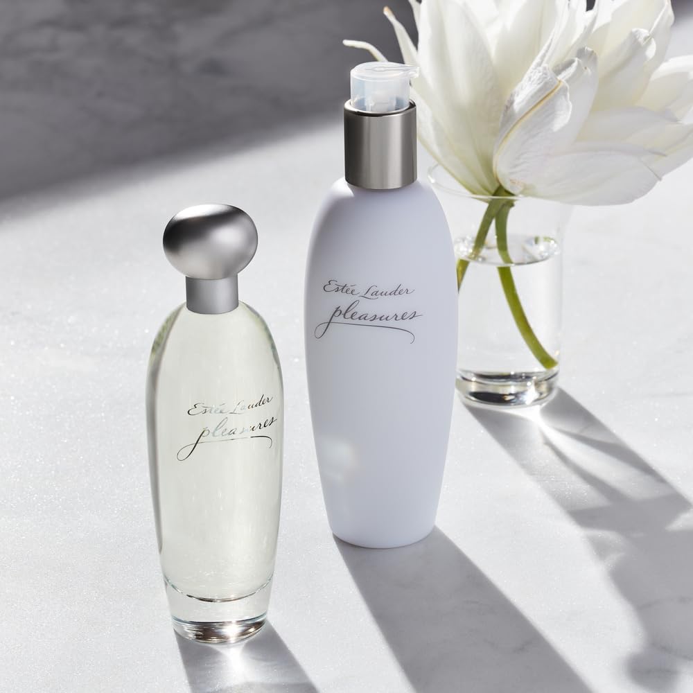 Close up of Estee Lauder Pleasures perfume label and bottle