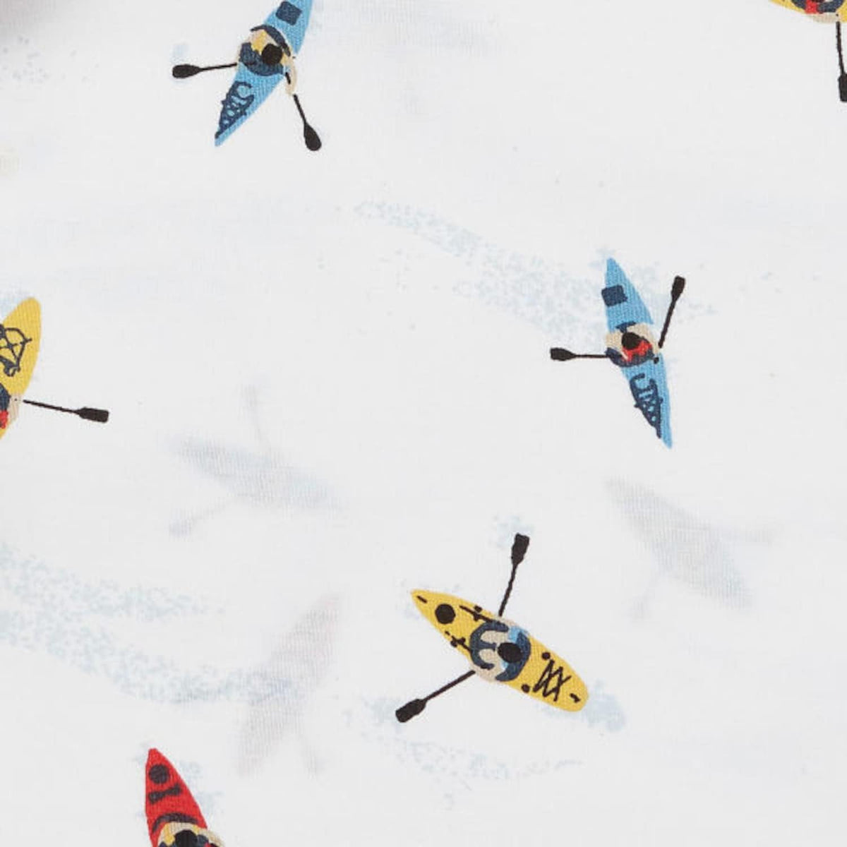 Close up of multi-colored kayak pattern on white cotton fabric