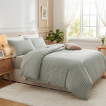 Matching envelope closure pillowcases matching the white and green pinstripe design