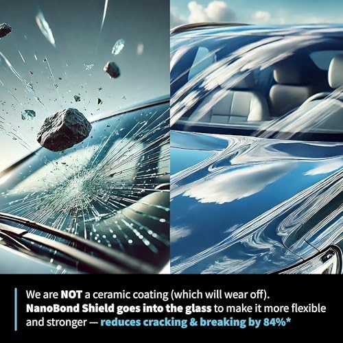 Water droplets beading up instantly on a car windshield treated with hydrophobic protection