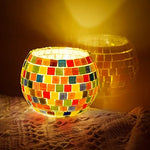 Detailed components of the mosaic art kit including glass jar and tiles