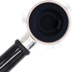 USEAMIE 54mm silicone blind filter disc resting in portafilter