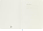 Moleskine notebook spine and rounded corners detail
