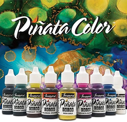 Jacquard art inks showcased with metallic gold and Blanco Blanco white bottles