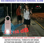 Close up of Mosaic safety alarm showing carabiner keychain attachment