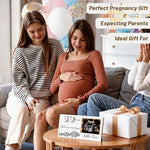 Lewtemi baby countdown weeks sonogram frame lit up in a dark room showing the soft eye protective ambient glow