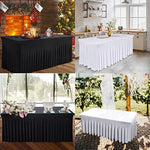 Event setup showing black table skirt in a wedding reception setting