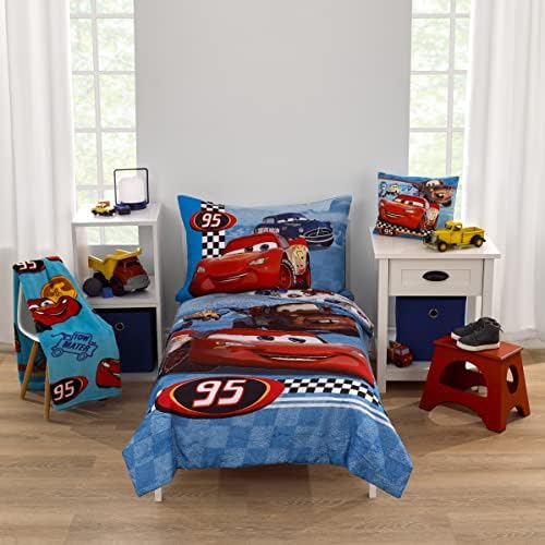 Detailed view of Lightning McQueen character print on the NoJo toddler blanket.