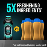 Tossing Downy Unstopables fresh scent laundry beads into an empty washing machine drum before a cycle.