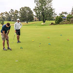 Four colored golf balls included with the GoSports set