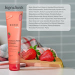 Strawberry mango flavor Boka toothpaste texture on a toothbrush