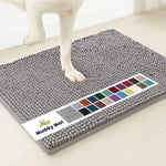 Close up of plush microfiber chenille texture on grey indoor mat
