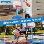 Toddler playing with Gmaophy indoor basketball hoop in living room
