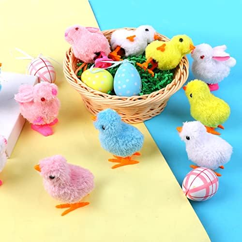 Toddler hand winding up the clockwise mechanism of the FOIMAS novelty animal toy